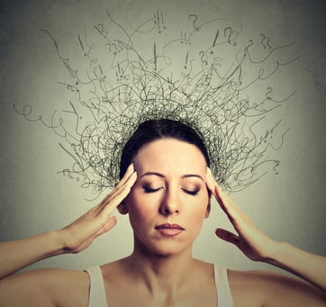Closeup young woman with worried stressed face expression eyes closed trying to concentrate with brain melting into lines question marks deep thinking.