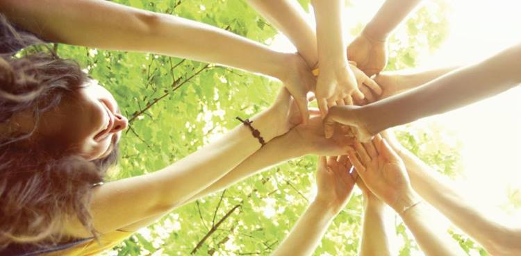Hands piled up