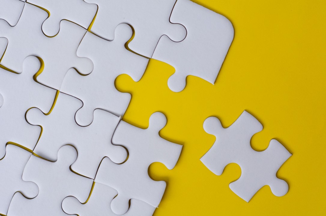 Puzzle pieces on a yellow background